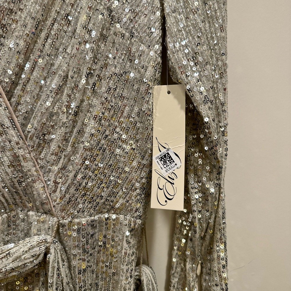 Glittery sequin silver jump suit brand new